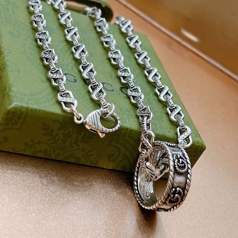 G*u*i necklaces